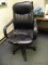(RM1) FAUX LEATHER ROLLING OFFICE CHAIR. SHOWS SLIGHT WEAR.