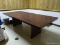 (LAUN) DARK WOODGRAIN CONFERENCE TABLE. MEASURES 95.5