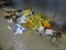 (WARE) LARGE FLOOR LOT OF ASSORTED LABELS AND STICKERS. LOT ALSO INCLUDES PVC AND IRON FITTINGS.