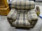 (WARE2) OVERSIZED PLAID CHAIR. A LOT OF WEAR AND STAINING.