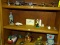 (RM8) SHELF LOT OF ASSORTED ITEMS TO INCLUDE: AN AVON PEWTERR AIRPLANE, 2 WIRE FLY FISHERMEN, A
