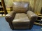 (RM8) BROWN LEATHER RECLINING CHAIR. DOES SHOW WEAR.