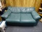 (RM8) IMMITATION GREEN LEATHER 2 CUSHION LOVESEAT. MEASURES 84