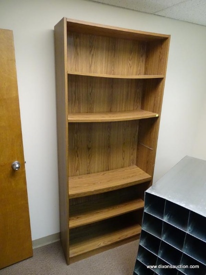 (RM2) WOODGRAIN BOOKCASE WITH 5 ADJUSTABLE SHELVES. SLIGHTLY BOWED. MEASURES 36" X 12" X 83".