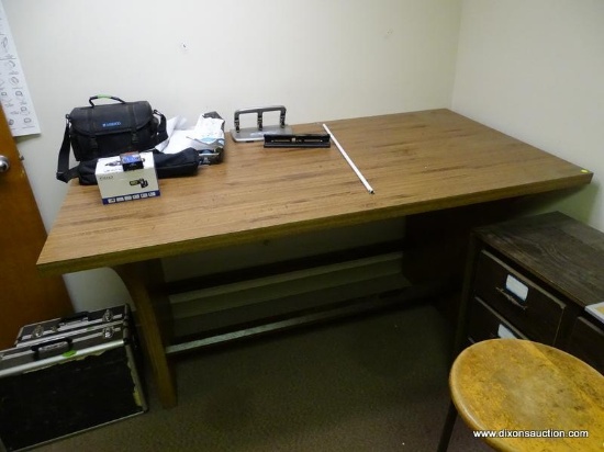 (RM3) LARGE WOODGRAIN DRAFTING TABLE. MEASURES 72" X 38" X 40".