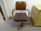 (RM11) VINTAGE ROLLING METAL AND VINYL OFFICE CHAIR WITH UPHOLSTERED SEAT.