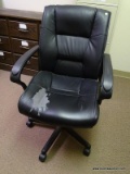 (RM3) FAUX LEATHER ROLLING OFFICE CHAIR. SHOWS RIPS AND WEAR.