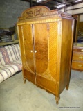 (WARE2) ANTIQUE WARDROBE. 2 DOORS WITH 3 INTEREIOR DOVETAIL DRAWERS. LOOKS LIKE BURRELLED WALNUT AND