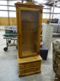 (WARE2) PINE GUN CABINET WITH 6 GUN SLOTS AND 2 LOWER LOCKING DRAWERS. MEASURES 25.5