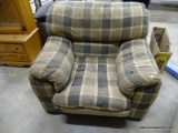 (WARE2) OVERSIZED PLAID CHAIR. A LOT OF WEAR AND STAINING.