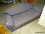 (WARE2) LIGHT BROWN UPHOLSTERED LOVE SEAT WITH SINGLE CUSHION SEAT. MISSING LEGS. MEASURES 62