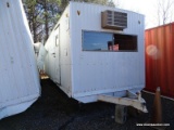 WHITE CONTRACTOR OFFICE TRAILER. RUSTED, NEEDS TIRES. PLEASE SEE PICTURES FOR CONDITION. COME