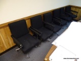 (RM10) SET OF (6) BLACK ROLLING CONFERENCE TABLE CHAIRS. ALL SHOW WEAR.