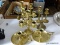 (LRM) BRASS LOT; LOT INCLUDES- SET OF 4 GRADUATED CANDLEHOLDERS- 9 IN - 5.5 IN WITH SNUFFER,