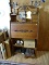 (DBED) DESK: ANTIQUE OAK DROP FRONT LARKIN DESK- REFINISHED, MIRRORED AND CARVED TOP WITH SHELF,