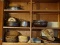 (KIT) CABINET LOT ; CONTENTS INCLUDE WOODEN SALAD BOWLS, CHROME AND GLASS CASSEROLE DISH, WOOD TRAY