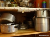 (KIT) SECOND SHELF OF CABINET ; INCLUDES POTS AND PANS