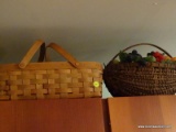 (KIT) BASKET LOT; ANTIQUE BASKET WITH ARTIFICIAL FRUIT AND A GERALD HENN HANDMADE BASKET