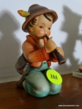 (LRM) HUMMEL FIGURE; HUMMEL FIGURE OF BOY PLAYING THE FLUTE- 4 IN H - GOEBEL MARK WITH THE BEE