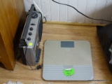 (DBED) RADIO AND SCALES; GE AM/FM RADIO AND CASSETTE PLAYER AND A SET OF DIGITAL SCALES