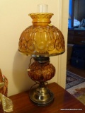 (UPHALL) LAMP; AMBER GLASS VICTORIAN STYLE LAMP WITH MATCHING SHADE- 22 IN H