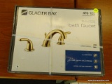 GLACIER BAY BATH FAUCET; #476 122 IN POLISHED BRASS. IS IN THE ORIGINAL BOX (HAS BEEN PLASTIC STRAPS