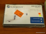 GLACIER BAY KITCHEN FAUCET; HAS A STAINLESS STEEL FINISH AND IS IN THE ORIGINAL BOX (HAS BEEN
