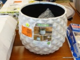 DURABLE BRAND PLANTER; PROTECTED AGAINST FADING, LIGHTER THAN CERAMIC, AND INCLUDES A DRAINAGE HOLE