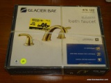 GLACIER BAY BATH FAUCET; #476 122 IN POLISHED BRASS. IS IN THE ORIGINAL BOX (HAS BEEN PLASTIC STRAPS