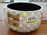 DURABLE BRAND PLANTER; PROTECTED AGAINST FADING, LIGHTER THAN CERAMIC, AND INCLUDES A DRAINAGE HOLE