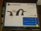 GLACIER BAY BATH FAUCET; #1000 707 865 IN BRONZE. IS IN THE ORIGINAL BOX (HAS BEEN OPENED AND