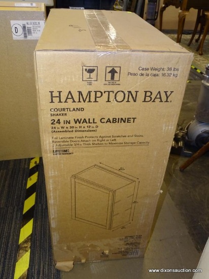 HAMPTON BAY 24" WALL CABINET; "COURTLAND" IN SHAKER STERLING GRAY. IS IN THE ORIGINAL BOX. MEASURES