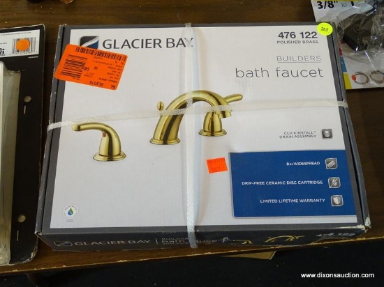 GLACIER BAY BATH FAUCET; #476 122 IN POLISHED BRASS. IS IN THE ORIGINAL BOX (HAS PLASTIC STRAPS