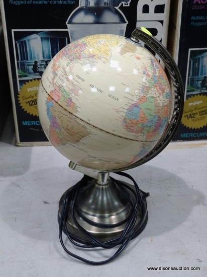GLOBE OF THE WORLD; SMALL GLOBE OF THE WORLD WITH LIGHT UP EQUATOR. IS IN GOOD CONDITION.