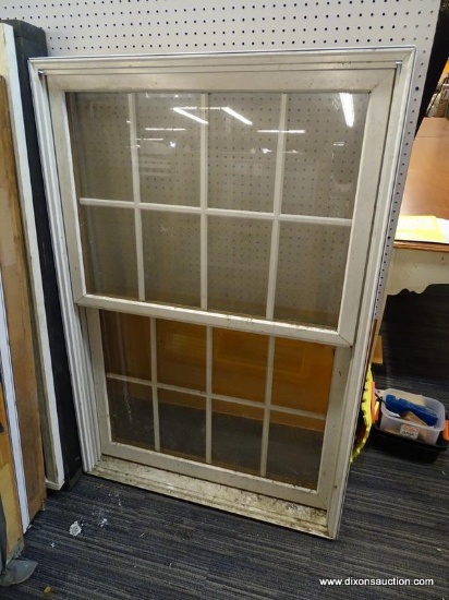 WINDOW; DOUBLE PANED CASED WINDOW IN WHITE. HAS A CRACK IN THE GLASS (SEE PHOTO) MEASURES 38 IN X 5