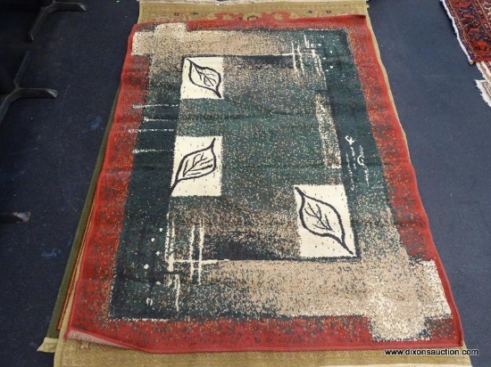 MACHINE MADE MODERN RUG. MEASURES 5'2" X 6'11".