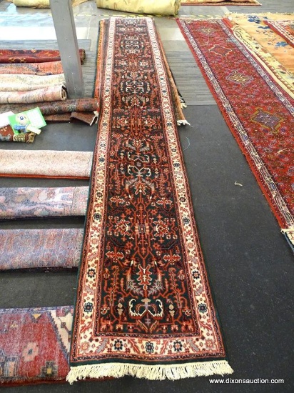 INDIA HARIZ RUG. MEASURES 2'5" X 16' 7".