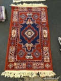 MACHINE MADE RUG. MEASURES 2' X 3'5