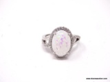 .925 STERLING SILVER LADIES 4 CT OPAL RING. SIZE 8.