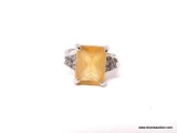 .925 STERLING SILVER LADIES 3 CT YELLOW OPAL RING. SIZE 8.