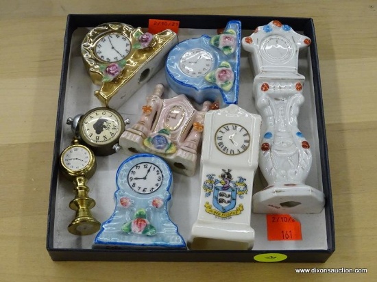 SMALL TRAY OF CLOCK STATUES