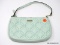 KATE SPADE MINT GREEN COLORED QUILTED LEATHER CLUTCH. MEASURES APPROX. 8