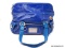 COACH POPPY BLUEBERRY PATENT LEATHER HANDBAG WITH SIDE POCKETS. MEASURES APPROX. 12