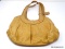 COACH TAN LEATHER HANDBAG WITH SNAP CLOUSE CENTER POCKET. MEASURES APPROX. 15