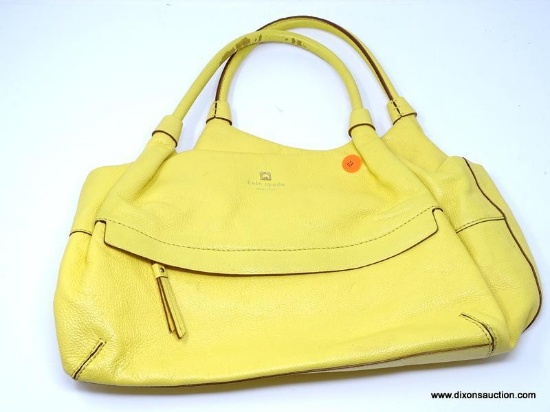 KATE SPADE YELLOW SOFT LEATHER HANDBAG WITH CENTER ZIPPER POCKET. MEASURES APPROX. 13" X 9". SHOWS