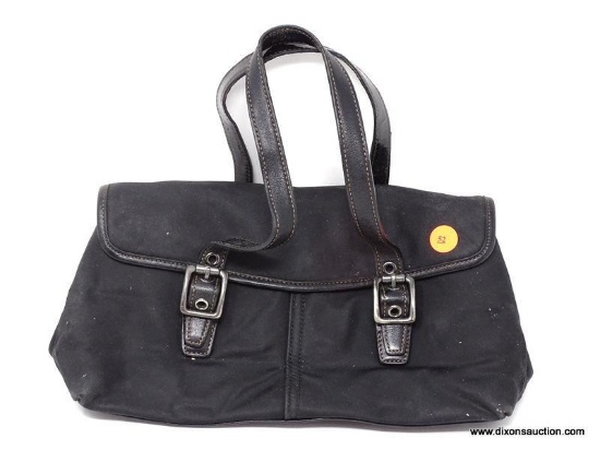 COACH BLACK HANDBAG WITH ENVELOPE FRONT CLOSURE. MEASURES APPROX. 11" X 6". SHOWS SIGNS OF WEAR.