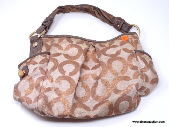 COACH BRONZE LOGO PRINT SATCHEL WITH SIDE POCKETS. MEASURES APPROX. 15" X 10". SHOWS SIGNS OF WEAR.