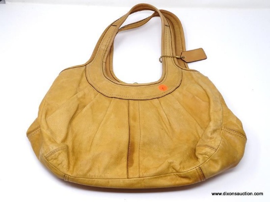 COACH TAN LEATHER HANDBAG WITH SNAP CLOUSE CENTER POCKET. MEASURES APPROX. 15" X 9". SHOWS SIGNS OF