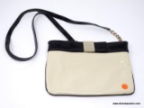 KATE SPADE BLACK AND CREAM COLORED PATEND LEATHER SHOULDER BAG. MEASURES 10.5