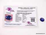 6.05 CT OVAL CUT BLUE SAPPHIRE. 12X10X4 GGL CERT.